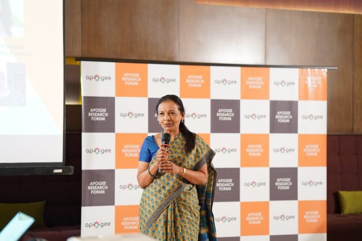 Delivering a key not speaking session addressing the gathering at the Women-Up, TN